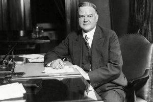 Herbert Hoover at his desk